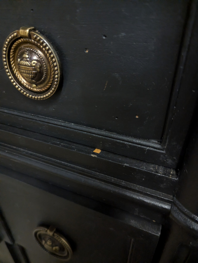 Commode réchampie noire de style Louis XVI